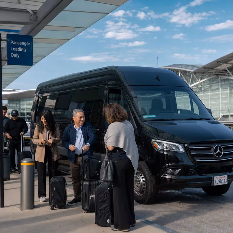Group boarding a white charter bus for Airport Transportation transportation in Sunnyvale