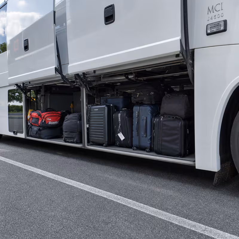 Party bus interior with wraparound leather seating and LED lighting in Sunnyvale