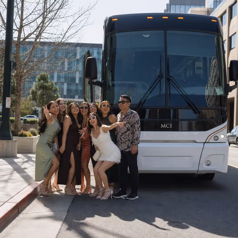 Passengers loading luggage while boarding an Sunnyvale group shuttle