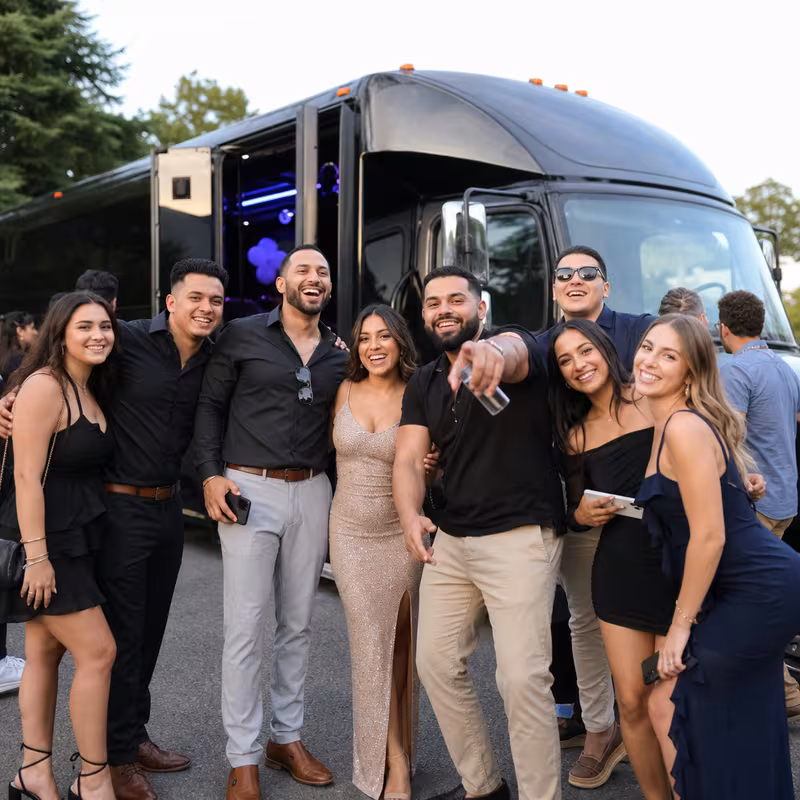 Party bus interior with wraparound leather seating and LED lighting in Sunnyvale