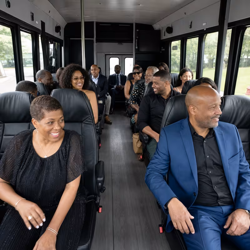 Group boarding a white charter bus for Private Event Transportation transportation in Sunnyvale