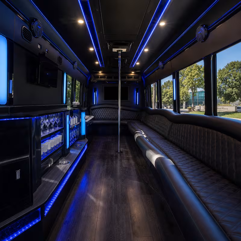 Party bus interior with wraparound leather seating and LED lighting in Sunnyvale