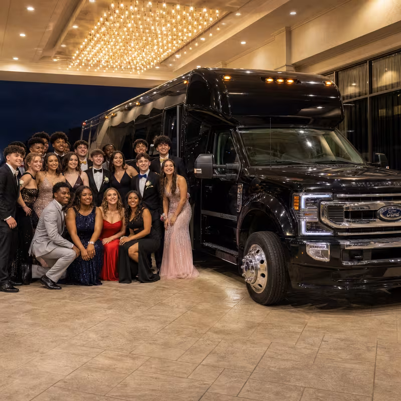 Party bus interior with wraparound leather seating and LED lighting in Sunnyvale