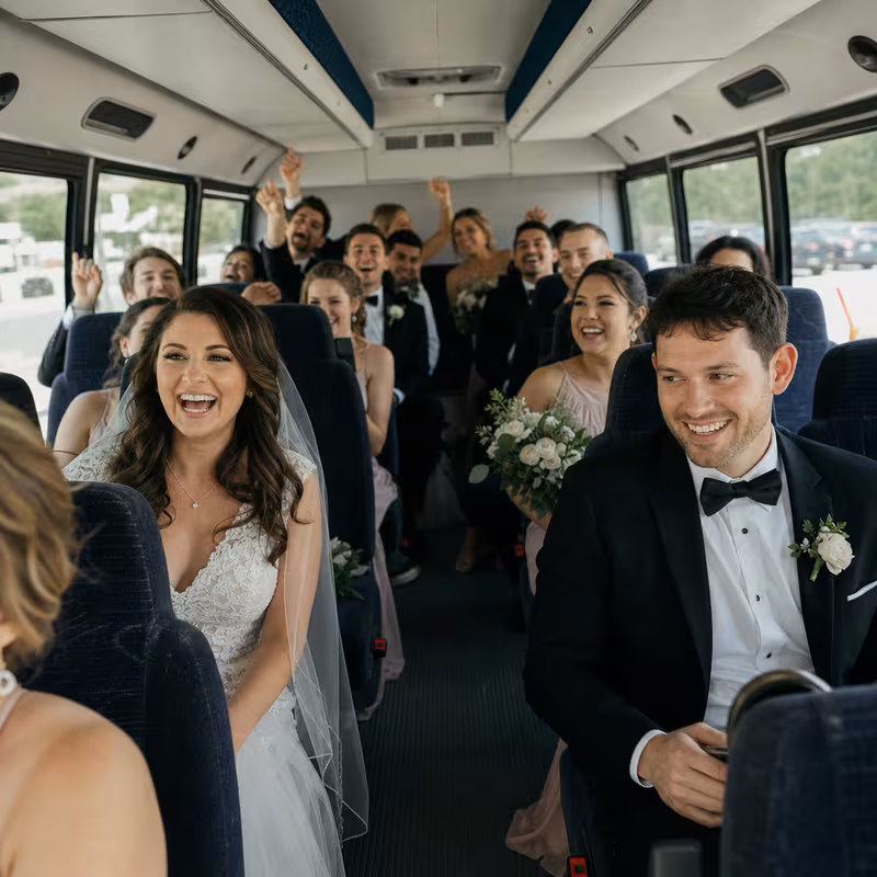 Group boarding a white charter bus for Wedding Transportation transportation in Sunnyvale